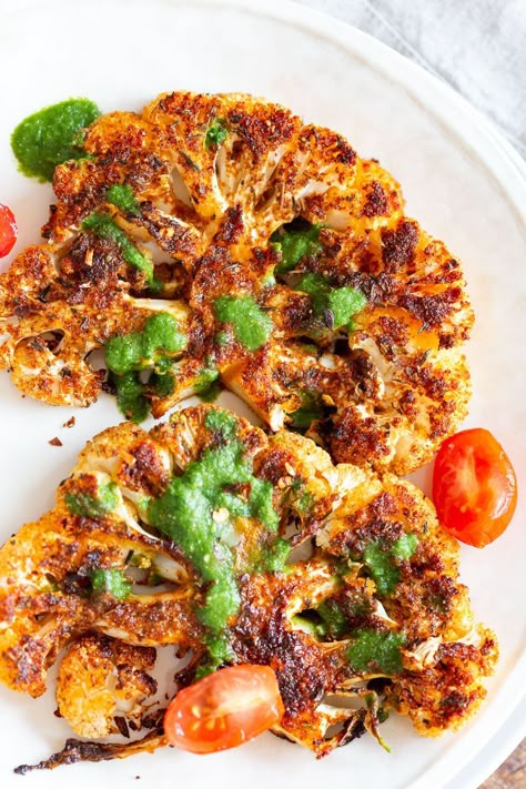 Cajun Roasted Cauliflower "Steaks" with Chimichurri Sauce - Vegan Richa Vegan Cajun, Steak With Chimichurri Sauce, Chimichurri Steak, Roasted Cauliflower Steaks, Spicy Cauliflower, Spiced Cauliflower, Vegan Richa, Cauliflower Steaks, Chimichurri Sauce