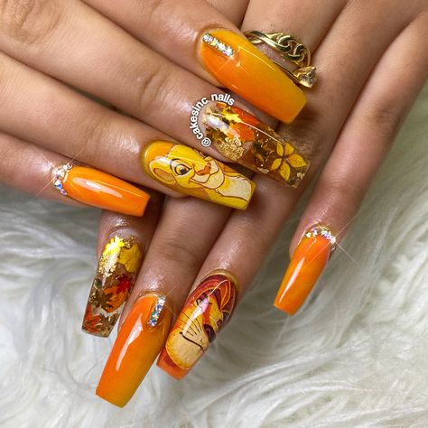 #acrylicnails #lionking #nails #uñas #uñasacrílicas Lion King Nails, Lion Face Paint, Lion And Lioness Tattoo, Lion Hand Tattoo, Lamb Tattoo, King Nails, King Orange, Orange Acrylic Nails, Clear Nail Tips