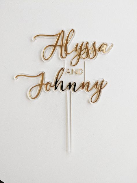 This cake topper features a clear acrylic background with acrylic lettering for a unique look! Customize with any name(s) in any of our standard acrylic colors. Illusion Cake, Elegant Wedding Cake Toppers, Cake Treats, Cake Topper Acrylic, Fondant Wedding Cakes, Gold Cake Topper, Winter Wedding Cake, Acrylic Signage, Pink Wedding Cake