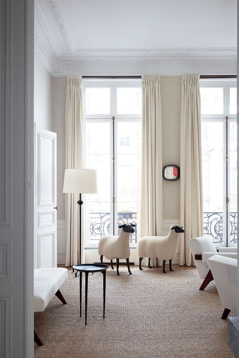 House tour: the chic Paris apartment of a design enthusiast and boutique owner - Vogue Australia Window Furnishings, Bronze Side Table, Parisian Decor, Stone Coffee Table, Alberto Giacometti, Boutique Owner, Bronze Table, Vogue Living, Parisian Apartment