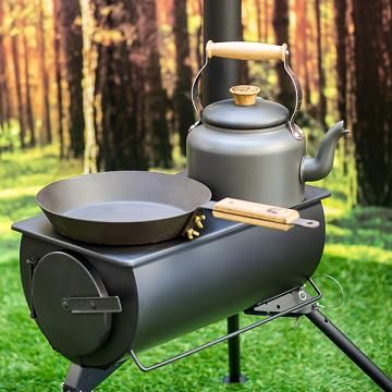 The Frontier Stove. A portable log burning stove Frontier Stove, Stove Design, Home Interior Accessories, Log Burning Stoves, Camp Stove, Bbq Grill Design, Humanitarian Aid, Small Bathroom Makeover, Kitchen Interior Design Decor