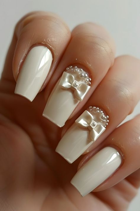 nails y2k, wedding nails 2024, nails xl, wedding nails design elegant, wedding nails extension for bride, wedding nails long, nails 3d, wedding nails mother of bride, wedding nails acrylic, wedding nails mother of groom, wedding nails natural, wedding nails xxl, wedding nails inspiration, wedding nails bride, wedding nails with pearls, nails unique, nails long, nails easy, wedding nails jewels, wedding nails for bride square, wedding nails pearl, nails, nails design ideas, creative nail patterns Wedding Nails For Bride Square, White Nails With Bow, Wedding Nails With Pearls, Cream White Nails, Nails Acrylic Wedding, Wedding Nails Pearl, Wedding Nails Long, Wedding Nails Acrylic, Wedding Nails Bride