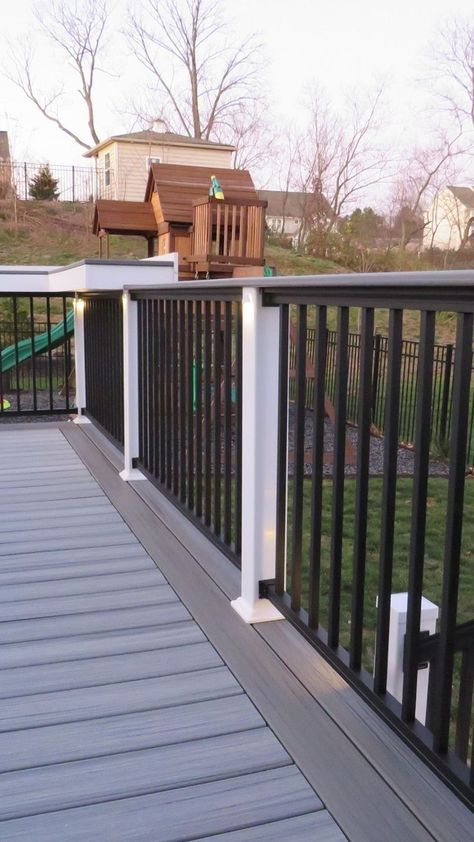 back aluminum railing with white vinyl posts on a gray trex deck White And Black Railing, Trex Deck Railing, Bar Railing, Trex Railing, Black Railing, Deck Railing Ideas, Under Deck, White Deck, Deck Remodel