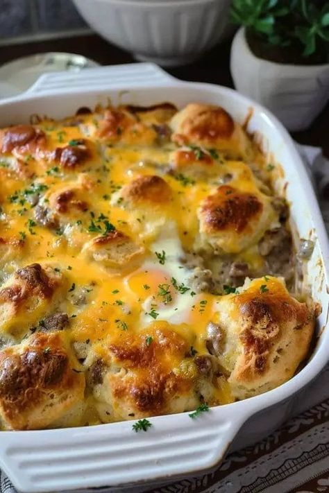 Biscuits and Gravy with Sausage and Egg Breakfast Casserole - Recipecs Biscuits And Gravy Egg Casserole, Sausage And Biscuit Breakfast Casserole, Sausage Egg And Biscuit Casserole, Biscuit Casserole Recipes Breakfast, Biscuits And Gravy For A Crowd, Biscuit Sausage Egg Casserole, Easy Breakfast Casserole With Biscuits, Sausage Recipes Breakfast, Egg And Sausage Casserole