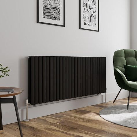 Key Features:Double oval panel designHorizontally hungBold black finishExcellent thermal conduction with premium mild steelCompatible with all heating systems10 year guaranteeWhat's Included:DuraTherm Horizontal Oval Tube Double Panel Designer Radiator - 600 x 1560mm BlackFixings and brackets includedPlease note: a radiator valve is not included and must be purchased separately.Add a touch of style to your home with a Duratherm Designer Radiator. This radiator is ideal for contemporary homes, with its unique panel design and stunning finish. The radiator is compatible with all heating systems for easier installation and comes with a reassuring 10-year guarantee for added peace of mind. Double oval panel designThis designer radiator features gorgeous oval panels for a contemporary Black Radiator, Plasterboard Wall, Flat Panel Radiators, Horizontal Radiators, Central Heating Radiators, Black Radiators, Central Heating System, Designer Radiator, Mild Steel