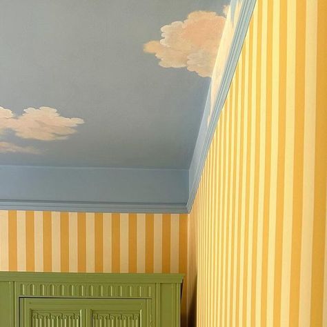 Jessica Sowerby - Colour and Interiors 🌈 on Instagram: "You know when you plan something in your mind and you think ‘that’s going to be lovely’, but when it’s actually in real life, it’s even BETTER than you dreamed of 🥹🥲😭 My cloudy stripey dream, come to life! 💫☁️   Wallpaper is @coloursofarley 🤍💛 Cloud ceiling of dreams by @melissawickhampaints ⛅️ Paints are all by the wonderful @paintandpaperlibrary (pr)  Obviously it’s not finished but there’s no way I was leaving you hanging! Also massive shoutout to Rick who has done literally every bit of diy/painting etc in here single handed, what a guy 💕" Hand Painted Clouds On Walls, Nursery Cloud Ceiling, Cloud Wallpaper On Ceiling, Cloud Ceiling Wallpaper, Painted Clouds On Ceiling, Diy Cloud Mural, Cloud Wallpaper Ceiling, Cloud Theme Bedroom, Cloud Ceiling Bedroom