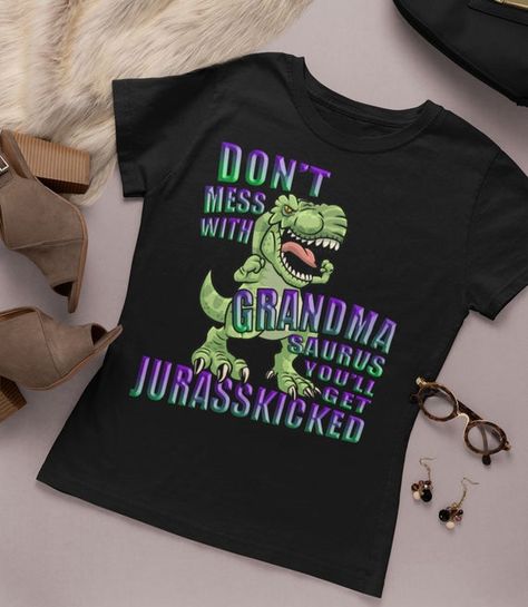 Funny Grandma t-shirt | Don't Mess With Grandma Saurus You'll Get Jurasskicked Funny Grandma shirts | Grandma giftProduct description: Unisex Bella Canvas Stylish fitted t-shirt. 4.2 oz, 100% combed ring-spun cotton jersey. Athletic Heather is 90% cotton, 10% polyester. Dark Grey Heather is 52% combed and ringspun cotton, 48% polyester Ash is 99% combed and ringspun cotton, 1% polyester. Made from light, high quality cotton. Supremely soft, superior quality. Modern, slightly fitted shape.*Sizing Funny Grandma Shirts, Nana T Shirts, Gifts For Truckers, Nana Shirts, Sisters Funny, Gifts For Uncle, Nana Gifts, Grandma Shirts, Sister Shirts