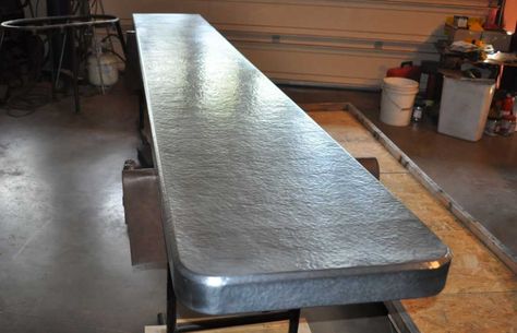 Hammered zinc countertop- Custom crafted using raw zinc hand hammered with beveled edge and rounded corners. Crafted in USA by local Montana Artist. Zinc Countertops, Diy Butcher Block, Trendy Kitchen Tile, Diy Kitchen Countertops, Cheap Kitchen Cabinets, Outdoor Kitchen Countertops, Outdoor Kitchen Bars, Kitchen Design Diy, Butcher Blocks