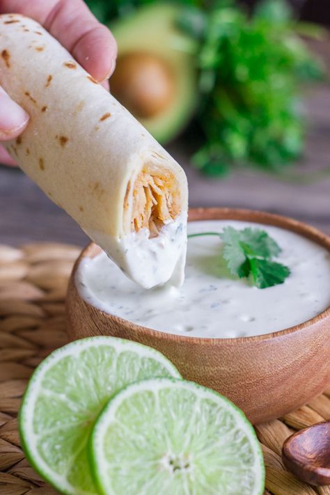 Baked Honey Lime Chicken Taquitos - Sweet and spicy shredded chicken wrapped up in a crispy, crunchy baked tortilla with some Cilantro Lime Cream for dipping. Cilantro Lime Cream, Spicy Shredded Chicken, Honey Lime Chicken, Lime Cream, Chicken Taquitos, Honey Lime, Lime Chicken, Cilantro Lime, Shredded Chicken