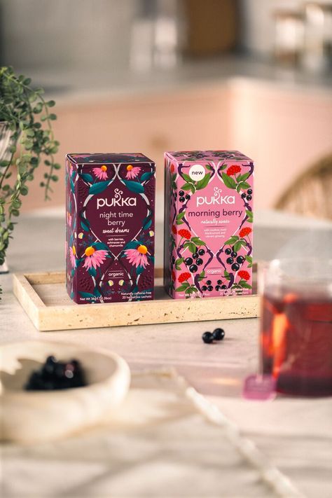 The perfect combo for the bursting berry lovers 💗💜 Discover this delicious daily duo for an uplifted morning and a peaceful night’s rest ☯️ Morning Berry - naturally awaken with an uplifting blend of blackcurrant, rooibos and ginseng to support vitality and awaken the mind​ Night Time Berry - soothe your senses and let go of the day with a restorative blend of organic berries, calming chamomile, valerian and echinacea. Shop online #Pukka #PukkaHerbs #MorningBerryTea #NightTimeBerryTea Tea Packaging Photography, Tea Package, Berry Tea, Flower Perfume, Peaceful Night, Organic Herbal Tea, Food Product, Tea Packaging, Hanging Pictures