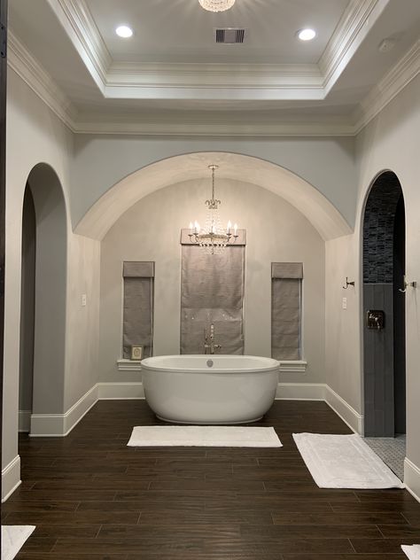 Freestanding soaking tub in barrel vaulted niche in master bathroom with coffered ceiling in this Tuscan inspired home. Jacuzzi Bathroom, Freestanding Soaking Tub, Master Suite Remodel, Barrel Ceiling, Farmhouse Industrial, Primary Bathroom, Plaster Ceiling, Tuscan Inspired, Bathroom Ceiling