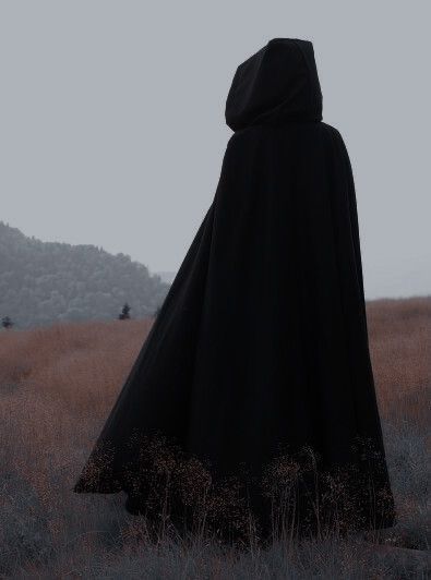 Cursing 101: How to break a curse | witchcraft for beginners and beginner witchcraft spells to know Cloaked Woman Aesthetic, Hooded Cloak Aesthetic, Mysterious Cloaked Character, Fantasy Cloak Aesthetic, Bardcore Medieval Aesthetic, Headless Aesthetic, Cloaked Figure Aesthetic, Black Cloak Aesthetic, Cloak Aesthetic