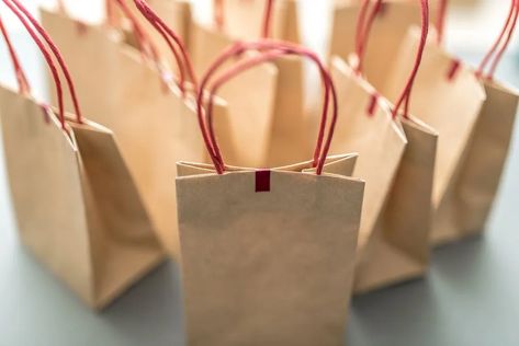 Creative tips, tricks, and ideas to build memorable swag bags for events | Webex Events (formerly Socio) Launch Party Gift Bag Ideas, Swag Bags Ideas Events Business, Swag Bag Ideas, Event Budget Template, Ideas For Events, Conference Swag, Event Budget, Company Swag, Swag Bags