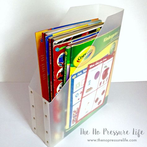 Magazine holders make great coloring book storage for kids or adults! You can find them at IKEA, dollar stores, and more. It's a great way to organize coloring books on shelves or in small spaces. Get more ideas for products to organize kids craft and art supplies in this post. Kids Toy Storage Diy, Diy Dollar Store Shelf, Craft Storage Ideas For Small Spaces, Coloring Book Storage, Craft Room Organization Storage, Art Caddy, Toy Storage Shelves, Craft Storage Organization, Kids Art Supplies