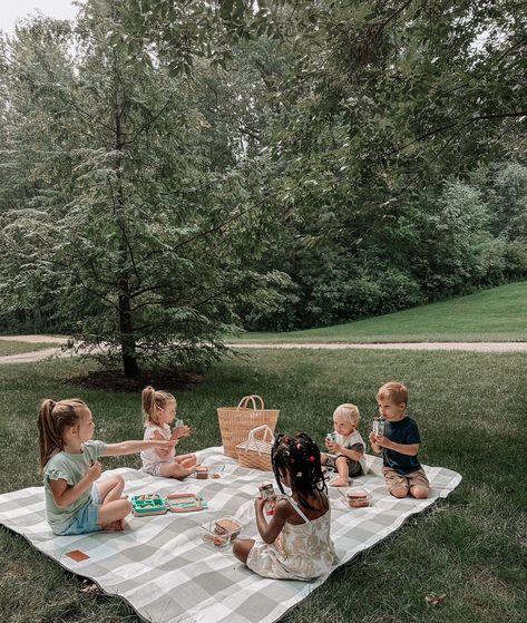 "Running out of summer activities to do with the kids?! Pack up a picnic and head to the park! 🧺 You’ll need some snacks, your friends and this cozy outdoor mega blanket! It’s plenty big enough for the kids to sit comfortably around, and the reverse side is insulated!" 📸: @myninetieshome #picnicparty #picnicinthepark #momtips #summeractivities Kids Playing Outside Aesthetic, Picnic With Baby, Picnic Ideas For Kids, Picnic With Kids, Big Family Aesthetic, Toddler Picnic, Kids Playing Outside, Traditional Wife, July Planner