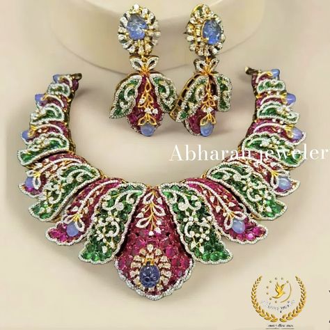 Add a touch of sophistication to your ensemble with this designer necklace and earrings set handcrafted in 925 silver from Abharan Jewelry. The beautiful color stone diamond setting makes it a timeless piece for any occasion. #elegantaccessories #abharanjewelry #925silver #diamondjewelry #colourstonejewellery Follow @abharan_jewelery for Luxury jewellery in affordable prices. DM or what’s app on 9663767765 for booking details. Colour Stone Jewellery, Color Stones Jewelry, Colour Stone, Stone Jewellery, Designer Necklace, Luxury Jewellery, Necklace And Earrings Set, Diamond Settings, Color Stone