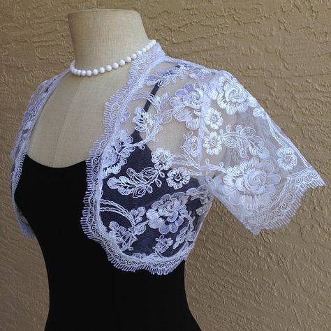 White Bridal Sheer Eyelet Lace Top Bridal Sheer Eyelet Lace vest (chaleco) to enhance your bridal gown or provide additional coverage. #shoplizfaccionetsy White Lace Jacket, Wedding Dress Detachable Skirt, Bridal Bolero Jacket, Lace Bolero Jacket, Elegant Ball Gowns, Floral Lace Shorts, Shrug For Dresses, Lace Bolero, Formal Wear Dresses