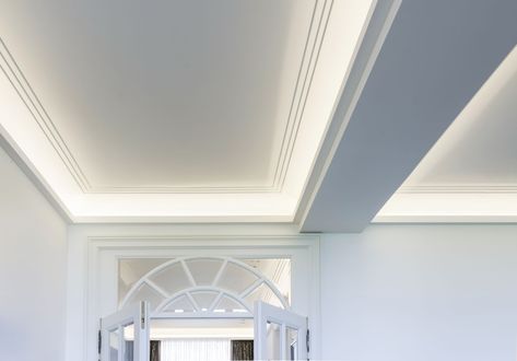 Introducing a coffered ceiling is a great way to reimagine a plain interior by adding a statement décor. It is also a perfect solution to introduce ambient lighting into any room. Our mouldings help to achieve this quickly and effortlessly. Visit our online store to see our coving range or call us for advice. Coffered Ceiling Led Lighting, Coving With Lighting, Ceiling Coving Lighting, Cove Ceiling Lighting, Cornice Lighting, Coffered Ceiling Lighting, Molding Lighting, Coving Lighting, Cove Lighting Ceiling