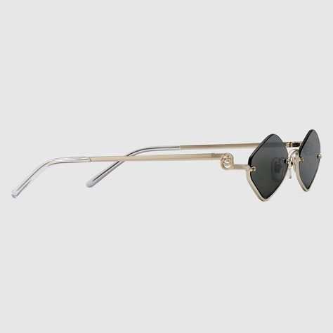 Gucci Geometric frame sunglasses Gucci Gold Sunglasses With Glass Lenses, Classic Gucci Glass Sunglasses, Luxury Gucci Sunglasses With Gradient Lenses, Luxury Sleek Gucci Sunglasses, Luxury Gucci Sunglasses With Metal Frame, Gucci Sunglasses, Oval Sunglasses, Sunglass Frames, Gucci