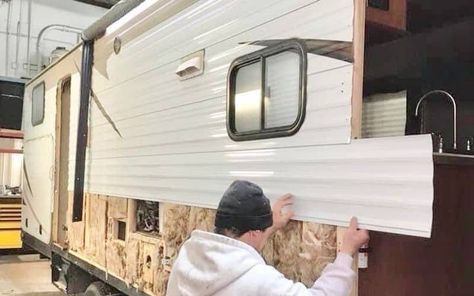 Are you in the market for a camper? If so, you’re probably neck-deep into RV research, including their basic construction and the various types of camper siding options. If you’re just beginning your search, however, you might be wondering: What is RV siding made out of? RV siding is typically made out of either aluminum or fiberglass; and while these are the most common materials used, not every RV is made the same. Fiberglass RVs are made from both laminated and molded fi... Rv Exterior Remodel, Camper Exterior, Diy Travel Trailer, Camper Flooring, Exterior Wall Panels, Siding Ideas, Rv Exterior, Exterior Wall Materials, Siding Options