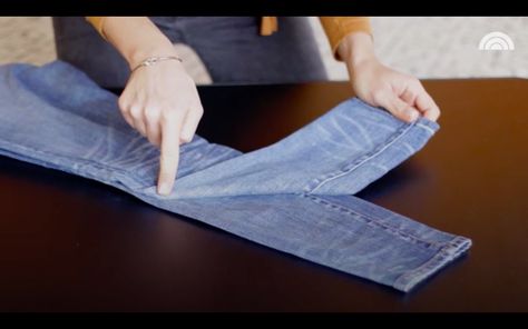 How to Pack Your Jeans to Save Space | Southern Living Folding Jeans To Save Space, How To Fold Jeans, How To Fold Pants, Folding Jeans, Suitcase Packing Tips, Rolled Jeans, Rolled Up Jeans, Packing Clothes, Crochet For Beginners Blanket