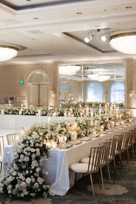 Long Table Wedding Reception Layout, High Table Design Wedding, White Flowers Reception, Vip Wedding Table, Rectangular Tables For Wedding Reception, Greenery Centerpiece Wedding Long Table, White Florals Wedding Reception, Wedding Floral Decor Reception Ideas, High Floral Centerpieces Wedding