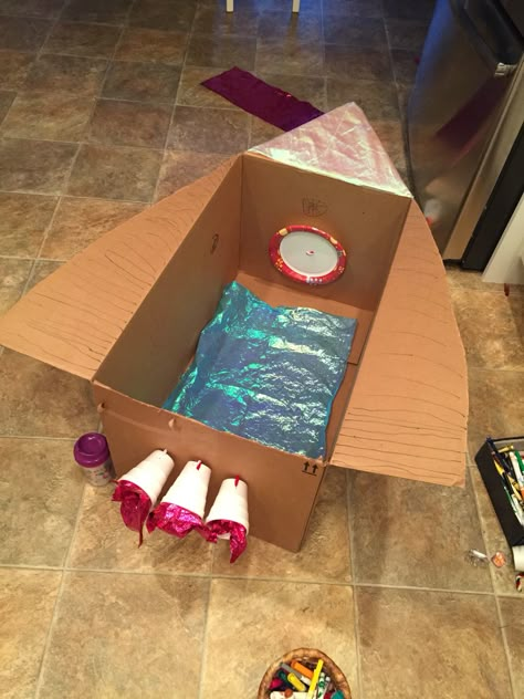 Rocket Ship Box Diy, Toddler Rocket Ship Craft, Rocket Ship Out Of Boxes, Nugget Rocket Ship Build, How To Make A Rocket Ship Out Of Boxes, Preschool Rocket Ship Activities, Rocket Ship Cardboard Boxes, Make A Rocket Ship For Kids, Ship Activities Preschool