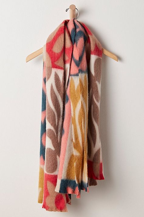 Add the perfect piece to your cold-weather accessories collection with this forever timeless scarf featured in an oversized, blanket-inspired silhouette with funky, colorful printing throughout and slightly raw bottom hem for an added vintage-inspired finishing touch. | Choosing Optimism Blanket Scarf by Free People Free People Scarf, Scarf Packaging, Holiday Scarves, Oversized Blanket, Boho Scarfs, Lipstick Bag, Chain Strap Bag, Colorful Scarf, Bandana Scarf