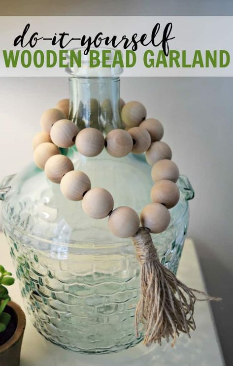 DIY Wooden Bead Garlands - Less than $10 - This Girl's Life Blog Diy Home Decor For Apartments, Wood Beads Diy, Simple Home Decor, Wooden Bead Garland, Wood Bead Garland, Simple Home, Décor Diy, Beaded Garland, Boho Home