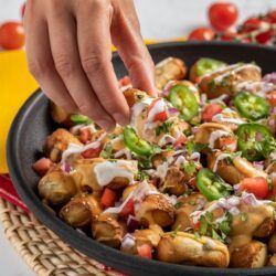 A classic favorite gets a fun twist with pretzels! Enjoy pretzels nachos smothered with cheddar sauce and all your favorite toppings. Prep time: 5 minutes - Cook time: 10 minutes - Total time: 15 minutes Serves: 2 Pretzel Nachos, Cheddar Sauce, Small Tomatoes, Cheese Sauce, Cayenne Peppers, Pretzels, Nachos, Serving Dishes, Brussel Sprout