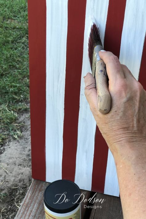 Red, white and blue on an DIY wooden American Flag sign. Flag Diy Projects, Wooden American Flag Decor, 4th Of July Porch Sign, Wood Flag Diy, Patriotic Porch Signs, Diy Wooden Candle, Beaded Candle Holders, Patriotic Porch, American Flag Painting