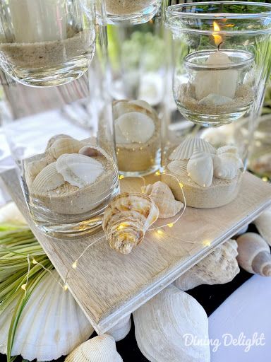 Dining Delight: Coastal Themed Tablescape in Black & White White Beach Party Decor, Coastal Wedding Reception Decor, Seashell Wedding Table Decor, White Beachy Party Dress, Coastal Birthday Theme, Coastal Table Centerpiece, Coastal Graduation Party, Coastal Engagement Party, Coastal Theme Party