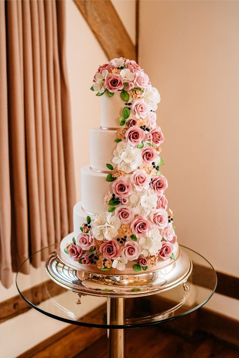 Four tier wedding cake with a show stopping cascade of sugar flowers.  Consisting of roses, hydrangea, berries and foliage.  Photo credit: Sarah Legge photography Winding Driveway, Wedding Cake Base, Cain Manor, Barn Style Wedding, 4 Tier Wedding Cake, Wedding Cake Prices, Wedding Cakes Ideas, Neutral Wedding Colors, Cake Pricing