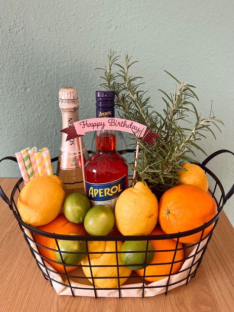 BirthdayAperol SpritzObstkorbpresent Aperol Spritz Basket, Aperol Gift Basket, Aperol Spritz Gift Basket, Aperol Spritz Gift, Creative Gift Baskets, Homemade Gift Baskets, Warm Scarves, Christmas Gift Basket Ideas, Easter Decorations Vintage