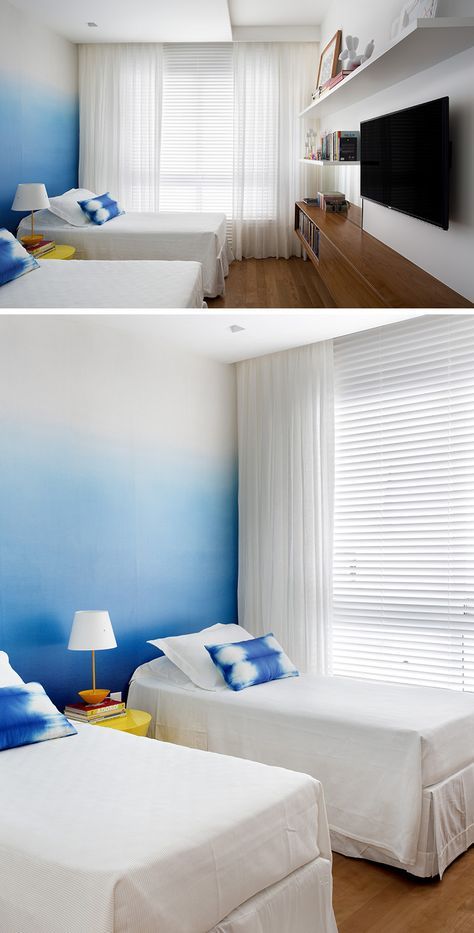 Bedroom Design Ideas - The designers of this apartment used an ombre wallpaper in the bedroom to create an accent wall that's stylish and less overpowering than a full blue wall. Colorful Accent Wall, Blue Wallpaper Bedroom, Bedroom Wallpaper Accent Wall, Ombre Wallpaper, Wall Blue, Ombre Wall, Full Blue, Bedroom Wallpaper, Blue Paint Colors