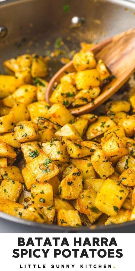 Batata Harra is a Lebanese spicy potato and cilantro dish! Very popular in the Middle East, you can easily make it at home with ingredients that you already have in your kitchen. Lebanese Garlic Potatoes, Batata Harra Lebanese, Lebanese Potatoes Recipe, Lebanese Meals, Lebanese Potatoes, Easy Lebanese Recipes, Dinner Veggies, Batata Harra, Spicy Potatoes