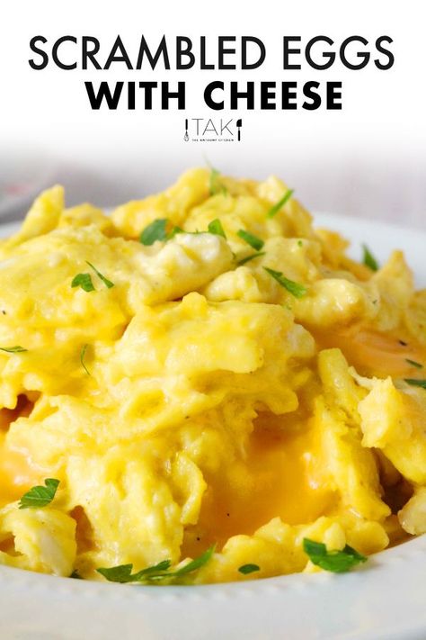 How to make the all-time best soft and fluffy Scrambled Eggs With Cheese. A simple, 5-minute recipe for perfectly fluffy cheesy eggs with giant, creamy curds! All you need is eggs, American cheese, your choice of dairy, and oil! You’ll be amazed at what a preheated pan, a little oil, and the turn of a stovetop knob can do to the incredible egg! The perfect easy breakfast recipe! Cheesy Scrambled Eggs, Best Scrambled Eggs, Scrambled Eggs With Cheese, Fluffy Scrambled Eggs, Scrambled Eggs Recipe, Cheesy Eggs, 5 Minute Meals, American Cheese, Egg Breakfast