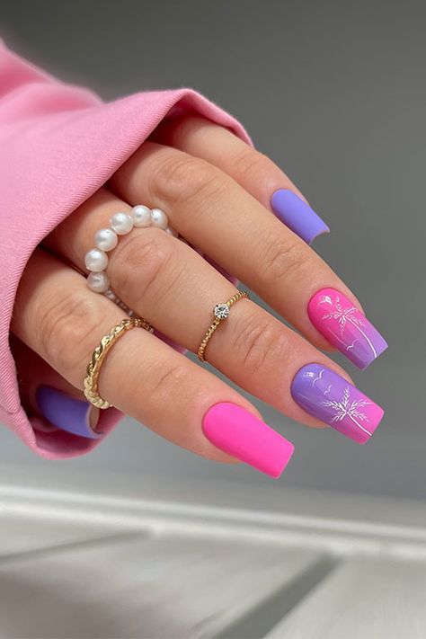 Matte purple and pink summer nails inspo with two accent glossy ombre pink and purple nails adorned with white palm trees Ombre Nails Purple And Pink, Pink Purple White Nails, Pink And Purple Ombré Nails, Lavender And Pink Nails, Pink And Lavender Nails, Hot Pink And Purple Nails, White Purple Nails, Pink And Blue Nails Design, Pink And Purple Nails Designs