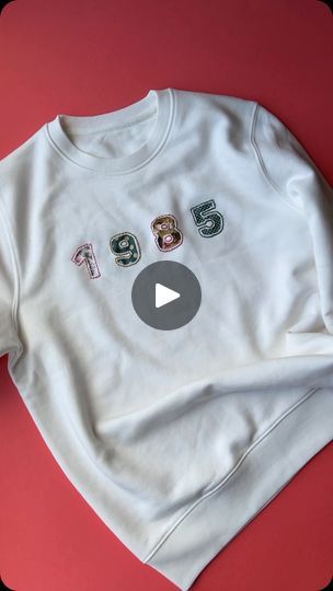 496K views · 42K reactions | What’s your year? Reverse appliqué is a fun way to add text and numbers to garments. I love how the pretty fabrics show through 🧡
.
.
#upcycledclothing 
#upcycledfashion 
#embroideredflowers 
#embroideredclothing 
#embroidereddenim 
#embroideredclothes 
#embroideredflorals 
#learntoembroider 
#mindfulart 
#slowstitching 
#sewingproject 
#embroiderypatterns 
#bordadolivre 
#createdtocreate 
#diycrafts 
#slowcraft 
#dmcthreads 
#dmcembroidery 
#springflowers 
#embroiderydesign 
#beginnerembroidery 
#embroiderywork 
#denimembroidery 
#sustainablefashion 
#embroiderhappyhoops 
#embroiderytutorial 
#embroideryprocess 
#embroideryproject 
#handsew | Jenny ~ Embroidery Art, Design & Crafts | Lesfm · Tramp Applique Stitches, Learning To Embroider, Denim Embroidery, Textile Art Embroidery, Sweet Clothes, Reverse Applique, Contemporary Embroidery, Hand Embroidery Videos, Altered Couture