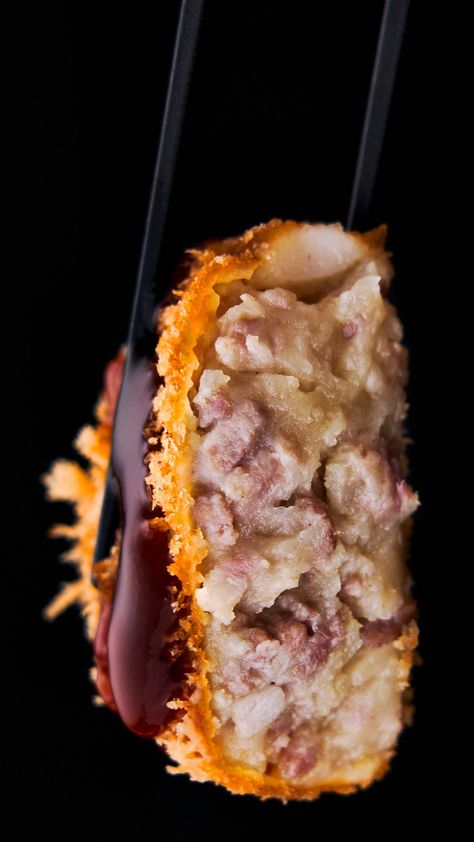 This crispy Japanese potato croquette (Korokke) is filled with a velvety potato filling studded with sweet caramelized onions and hand-minced pork. Japanese Potato Croquettes, Japanese Croquette, Potato Croquette, Japanese Meals, Japanese Potato, Potato Filling, Potato Croquettes, Minced Pork, Asian Inspired Dishes