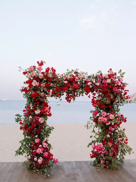 Pink Floral Backdrop Wedding, Light Pink And Red Wedding Flowers, Romantic Red And Pink Wedding, Red And White Beach Wedding, Red And Pink Tropical Wedding, Red Pink And White Wedding Flowers, Red Floral Arch Wedding, Pink Red Wedding Decor, Red And Pink Floral Arch