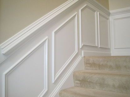 You can find more information for how we installed this chair rail & wainscoting in our entry on my blog at- http://designedtodwell.blogspot.com/2012/01/tips-for-installing-chair-rail.html Staircase Wainscoting, Wainscoting Design, Picture Frame Wainscoting, Wainscoting Hallway, Wainscoting Stairs, Installing Wainscoting, Wainscoting Ideas, Wainscoting Bedroom, Wainscoting Bathroom