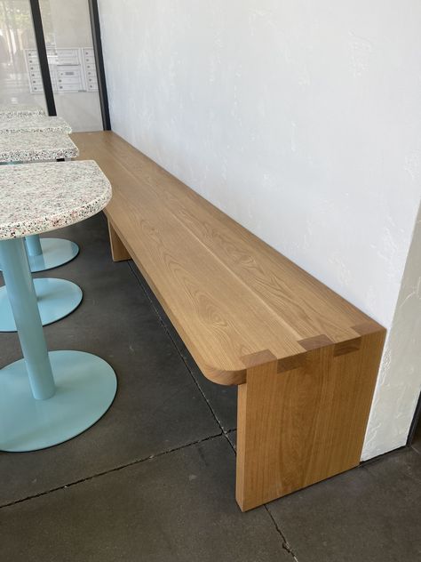 Wall mounted white oak bench seating in Pine Coffee Supply in Boise, Idaho. Custom built by Iron Timber. Oak Bench Seat, White Oak Bench, Timber Bench Seat, Chairs Restaurant, Caldwell Idaho, Restaurant Tables And Chairs, Coffee Supplies, Oak Bench, Box Joints