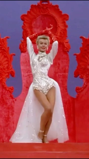 This Was Hollywood on Instagram: "Entering December like Vera-Ellen in White Christmas (1954). Learn all about this dancing queen in my book, THIS WAS HOLLYWOOD. Available wherever you get your books (LINK IN BIO)!!! #veraellen #christmas" White Christmas Movie Dresses, Vera Ellen White Christmas Pink Dress, White Christmas Aesthetic Movie, Vera Ellen White Christmas Red Dress, Mariah Bell Figure Skater, Vera Ellen, Dancing Queen, Deck The Halls, White Christmas