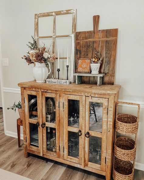 APRIL URIBÉ on Instagram: “This weekend is going to be perfect with sunshine ☀️ and cooler weather. I plan on doing a little cleaning and opening the windows for…” Light Wood Sideboard, Beige Living Room Walls, White Dining Room Table, Dark Wood Sideboard, Black Pulls, Warm Wood Flooring, Taupe Walls, White Wainscoting, Sideboard Decor