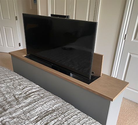 Automated End bed TV lift cabinet with oak top Metal Frame Tv Unit, Retractable Tv Stand Hidden Tv, Hidden Tv Bedframe, End Of Bed Tv Lift Cabinet, End Of Bed Tv Stand, Tv At End Of Bed Ideas, Lift Tv Cabinet, Tv Lift Bedroom, Tv At End Of Bed