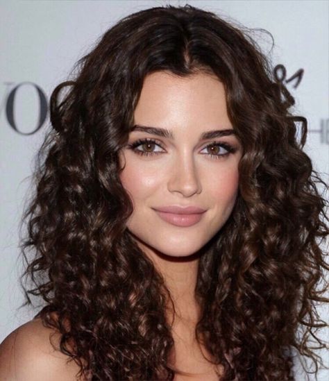 Celebrities With Naturally Curly Hair, Dark Brown Curly Hair Pale Skin, Italian Woman Curly Hair, Natural Curly Hair Middle Part, Curly Medium Brown Hair, Heart Face Shape Curly Hairstyles, Expensive Brunette Curly Hair, Square Face Curly Hairstyles, Best Color Hair For Brown Eyes