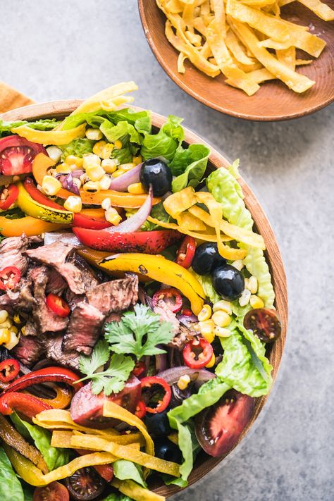 Cinco de Mayo is around the corner ~ and it's the perfect excuse to dine al fresco.  I've got a Mexican themed menu from gazpacho to dessert...delicioso! #easy #recipes #mexican #cincodemayo #barbecue #picnic #spring #latin #salsa #aguafresca #gazpacho #barbacoa Fajita Taco Salad, Steak Fajita Salad, Fajita Taco, Homemade Tortilla Strips, Fajita Steak, Mexican Fajitas, Mexican Steak, Fajita Salad, Steak Salad Recipe