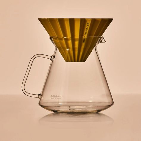 This ORIGAMI original server is based on the famous HARIO server, the only manufacturer of heat resistant glass in Japan. A glass handle is attached to the server to create a sense of unity, and the ORIGAMI dripper stands out with its simple design. The shape of the server with a bulged bottom makes it easier to feel the aroma, and is frequently used in competitions. This is a server that is easy to use in the store or at home. #coffeebreak #drippers #coffeegram #dripper #origamimugs #coffe... Origami Dripper, Coffee Server, Coffee Dripper, Heat Resistant Glass, Natural Minerals, Coffee Break, Coffee Time, Vintage Dior, Colour Palette