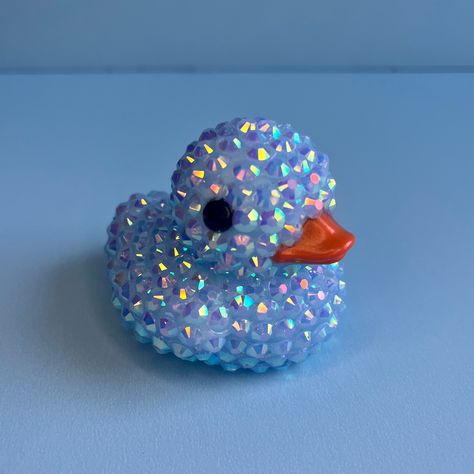 Meet Duke Duck! He's a hand-rhinestoned miniature rubber duck. Great baby shower gift, Easter basket gift, desk chotski, or bathroom decor! A favorite item for cruising duck lovers or Jeep ducking. A unique gift to put a smile on a loved ones face or to keep for yourself! Packed in a gift box with a personalized note!  Approx. 2 inches tall, 2 inches wide, 2 inches long  ** Each figure might vary slightly in color, size, and design. Rubber Duck Lights, Duck Lover Gifts, Bedazzled Stuff, Ducky Baby Shower, Rubber Ducky Baby Shower, Duck Decor, Rhinestone Projects, Mini Things, Rubber Ducky